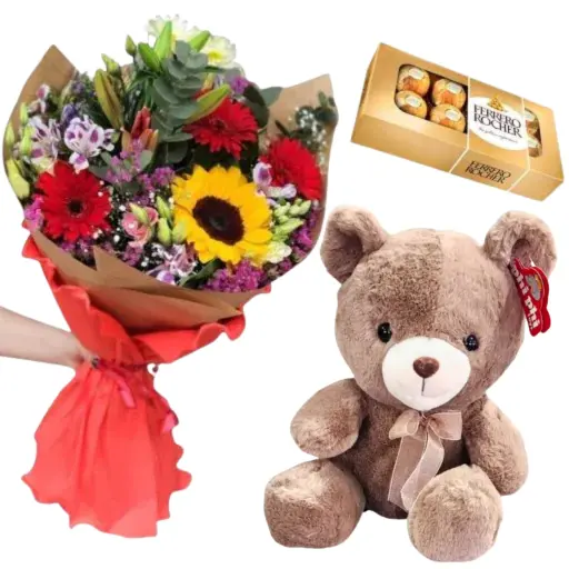 Ramo con flores de estacion con chocolate y peluche 